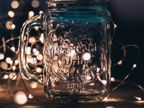 A glass jar with fairy lights